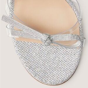New never worn Stuart Weitzman Bow 100 Slide Clear/Silver